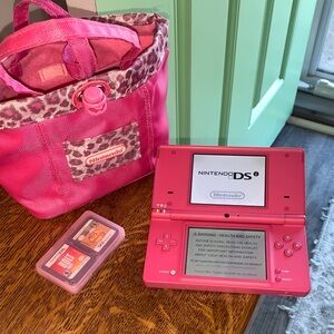 Nintendo DS Handheld Gaming System - 4 Games, Charger , & Bag Included